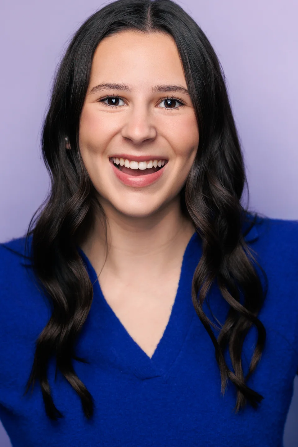 A warm, smiling portrait of Ella